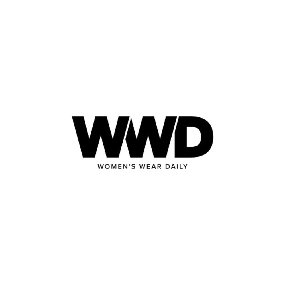 Women's Wear Daily logo, "WWD WOMEN'S WEAR DAILY" in black on white.