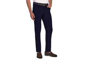 The McDaniel 5 Pocket Pant: Navy, shown as slim-fit chinos with a black belt and brown loafers, offering wrinkle-resistant, quick-dry, eco-friendly performance.