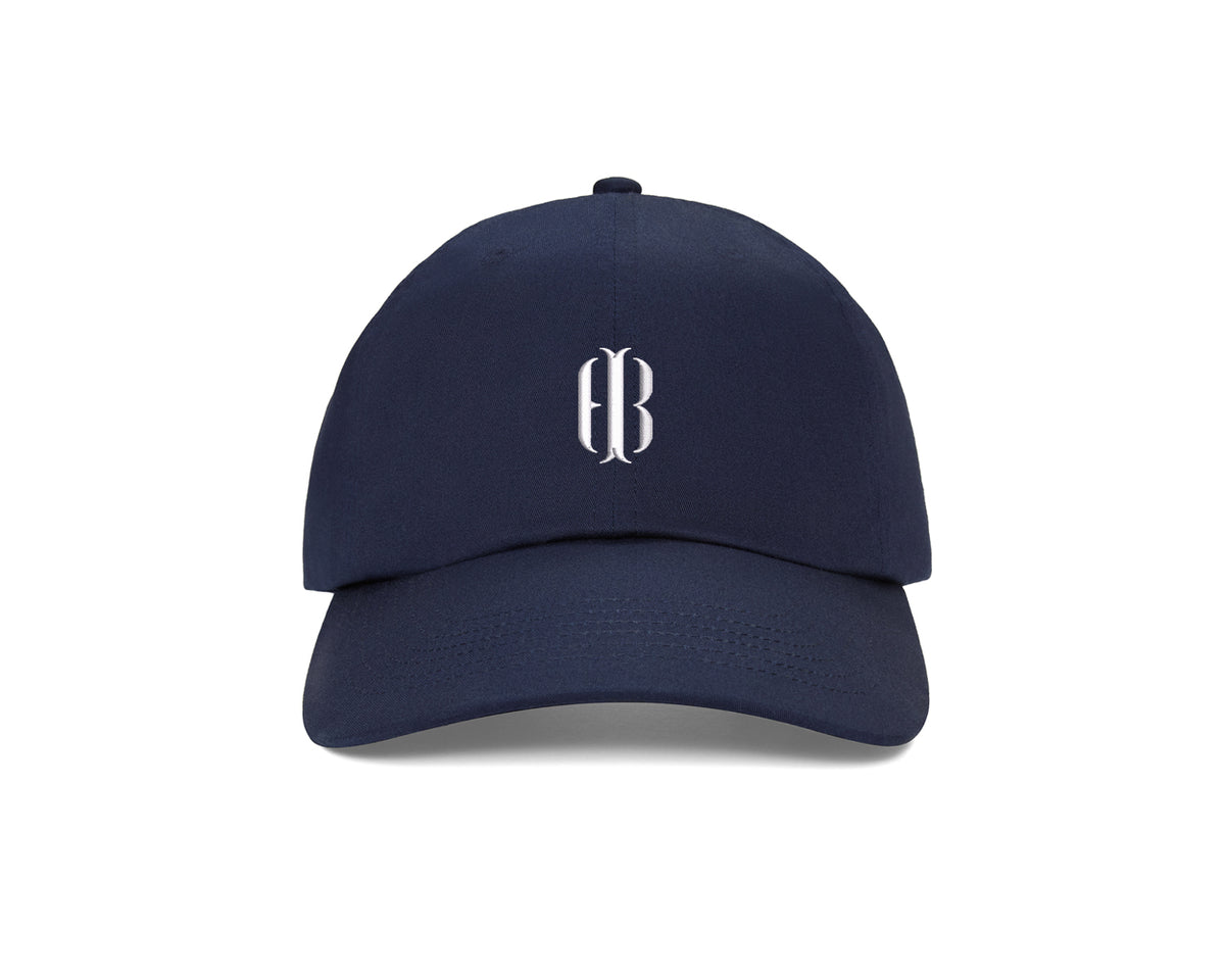 The Lightweight Cotton Hat: Navy with HB Icon, featuring a white embroidered logo on the front, adjustable closure, and six-panel design for comfort and sun protection.