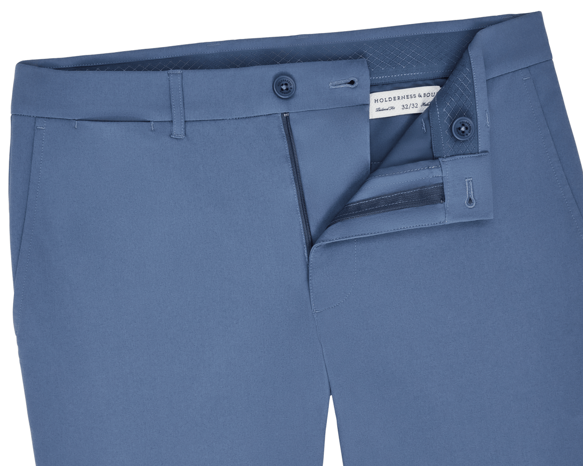 Holderness & Bourne Men’s Blue Golf Shorts with a brand label on a white background