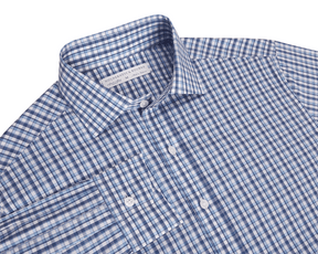 Blue and white checkered button up shirt with a collar on a white background
