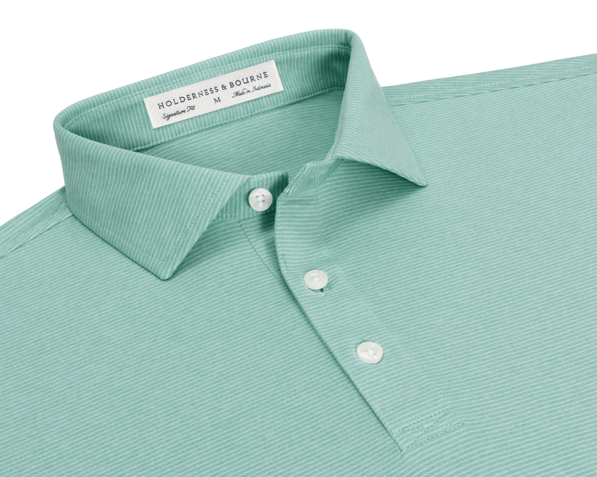 Collar and placket detail of The Holland Shirt: Heathered Cascade Green, showing the fine heathered stripes, spread collar, three buttons, and Signature Fit label.