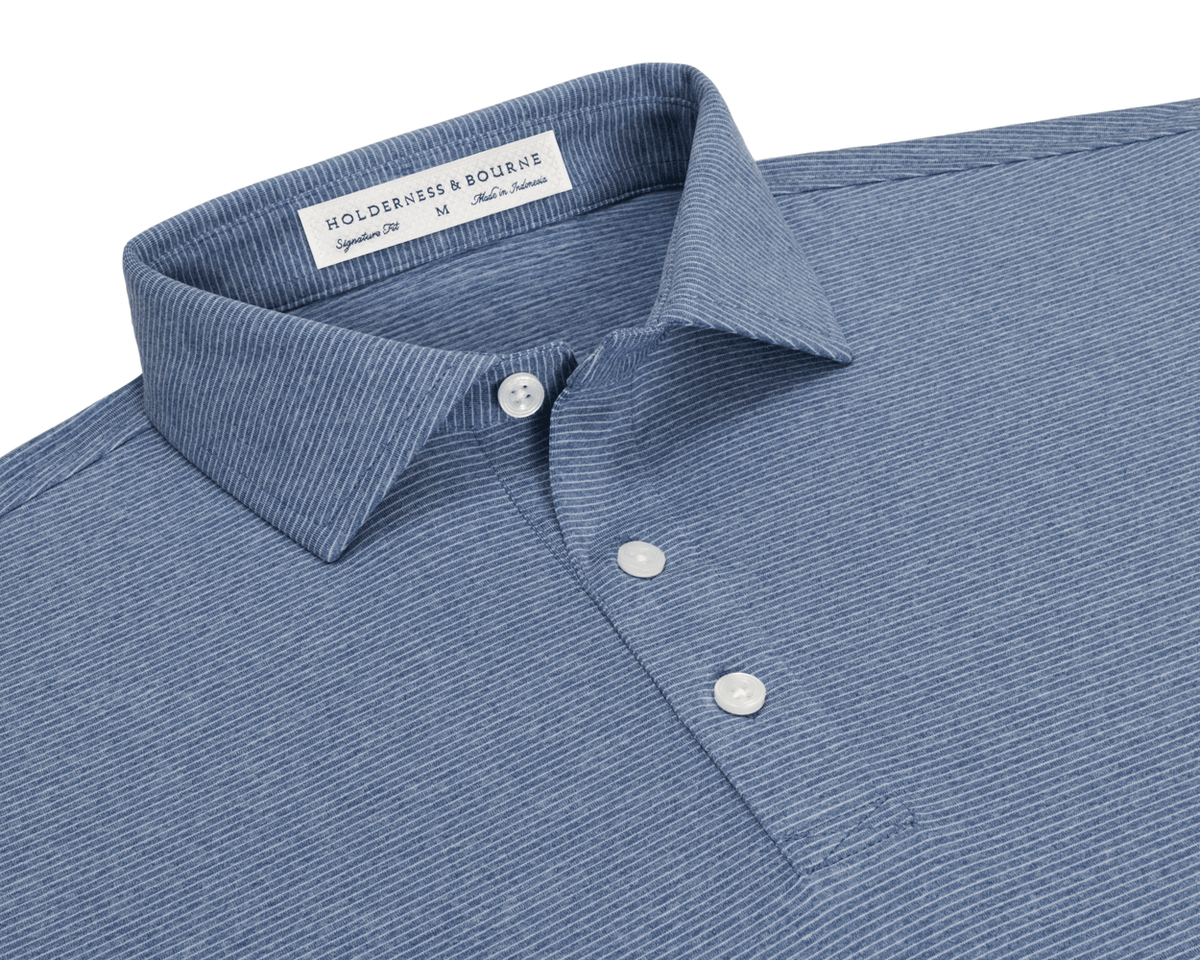 Collar and placket detail of The Holland Shirt: Heathered Pacific Blue, showing the fine heathered stripes, spread collar, three buttons, and Signature Fit label.