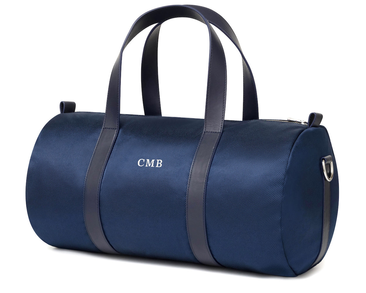Navy banker bags with dark leather straps and embroidered lettering from Holderness and Bourne angled to the left.