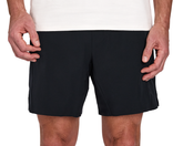 Person wearing The Saunders Short: Black, featuring a quick-drying tech blend and four-way stretch, with hands resting at sides.
