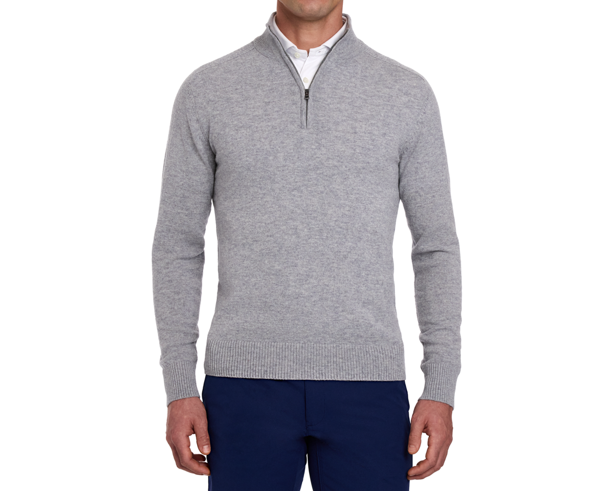 Man wearing a Holderness & Bourne Men’s Gray Quarter Zip Sweater on a white background