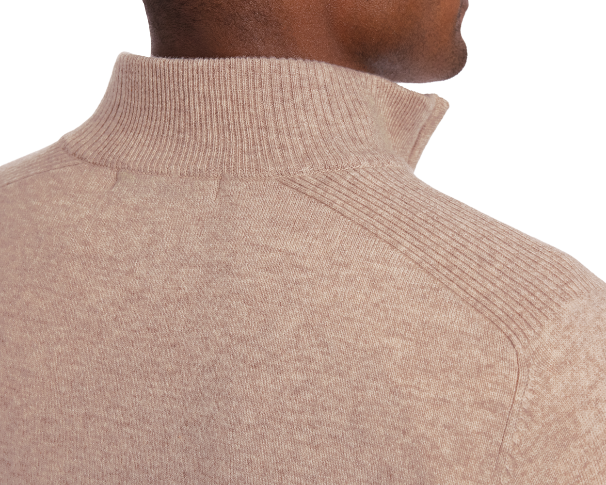 Close-up of Holderness & Bourne Men’s Tan Pullover Sweater on a person with a white background