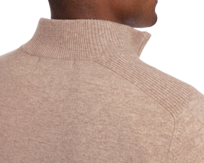 Close-up of Holderness & Bourne Men’s Tan Pullover Sweater on a person with a white background