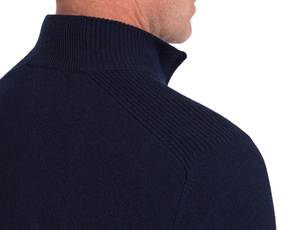 Holderness & Bourne Men’s Navy Quarter Zip Sweater turtleneck worn by a person on a white background
