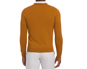 Holderness & Bourne Men’s Golden Yellow Pullover Sweater behind worn by a person on a white background