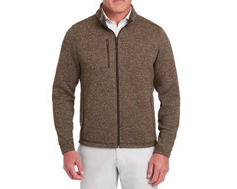 Man wearing Holderness & Bourne Men’s Chestnut Fleece Jacket over a white shirt on a white background