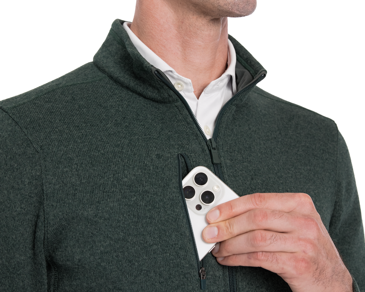 Person wearing a Holderness & Bourne Men’s Dark Green Fleece Jacket holding a smartphone with a white case.