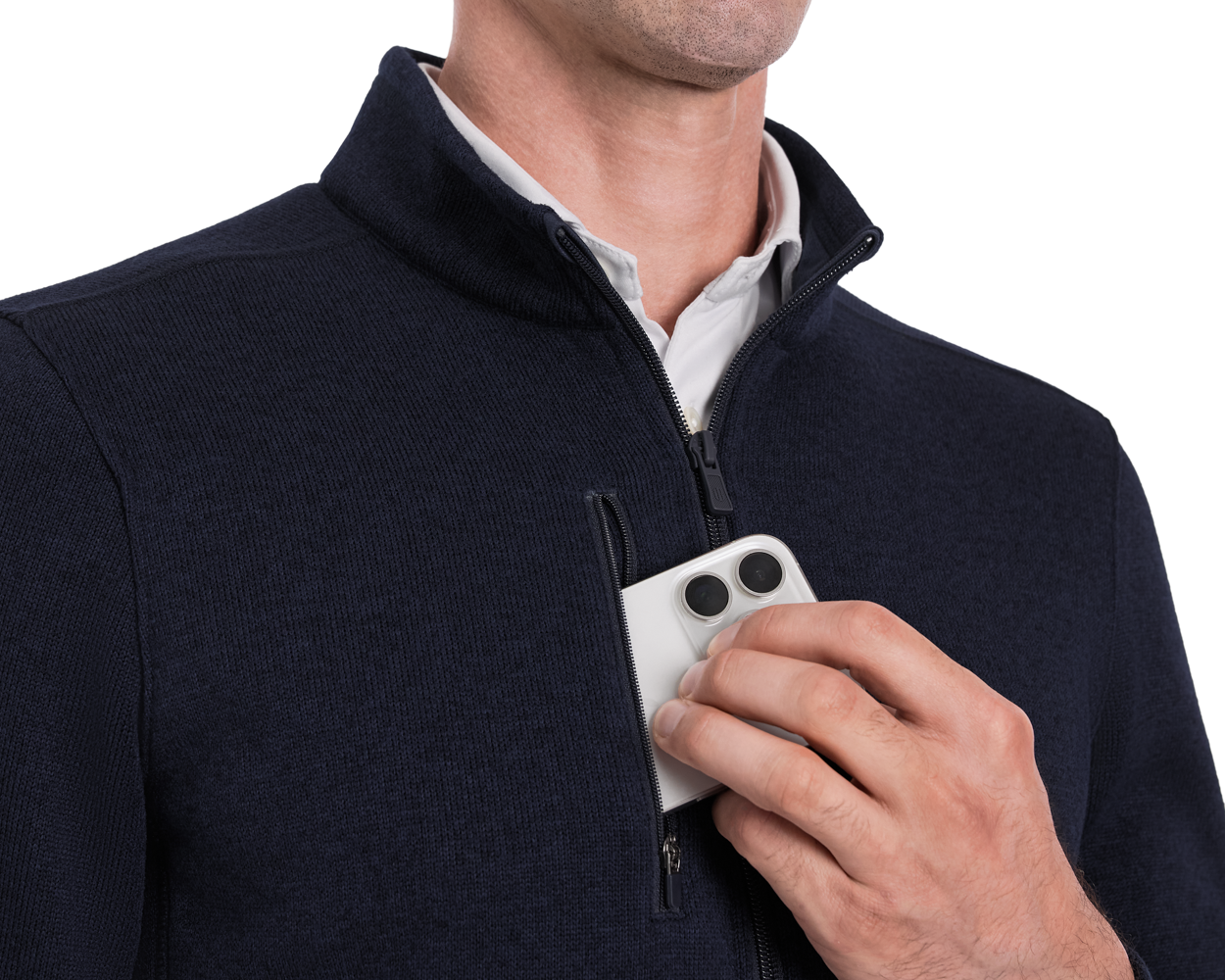 Person wearing Holderness & Bourne Men’s Navy Zip Up Jackett with a white phone in pocket on a white background