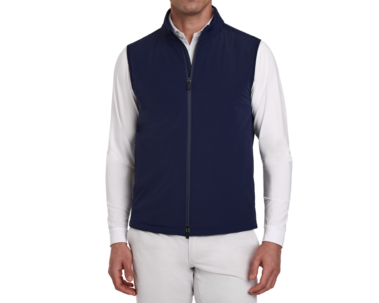 Man wearing a Holderness & Bourne Men’s Navy Blue Vest over a white shirt on a white background