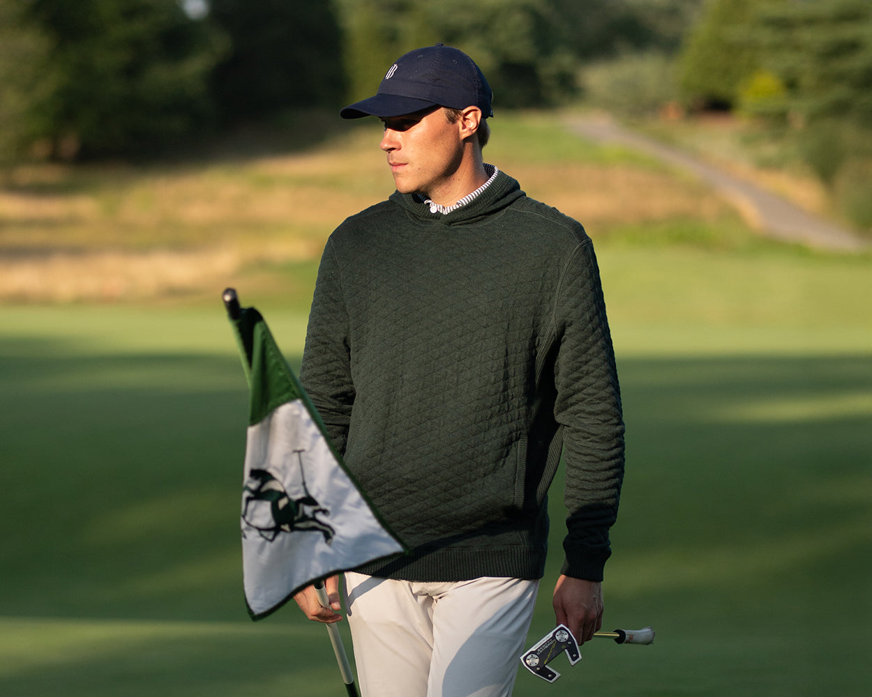 Model Wearing Holderness & Bourne Mens Dark Green Hoodie