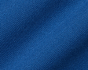Close-up of The Anderson Shirt: Maidstone Blue, highlighting its fine diagonal weave pattern and structured spread collar, made from stretch jersey knit for comfort.