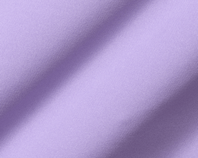 Close-up of The Anderson Shirt: Tudor, showcasing its soft lilac fabric with fine diagonal ribs, highlighting its luxurious texture and performance knit qualities.