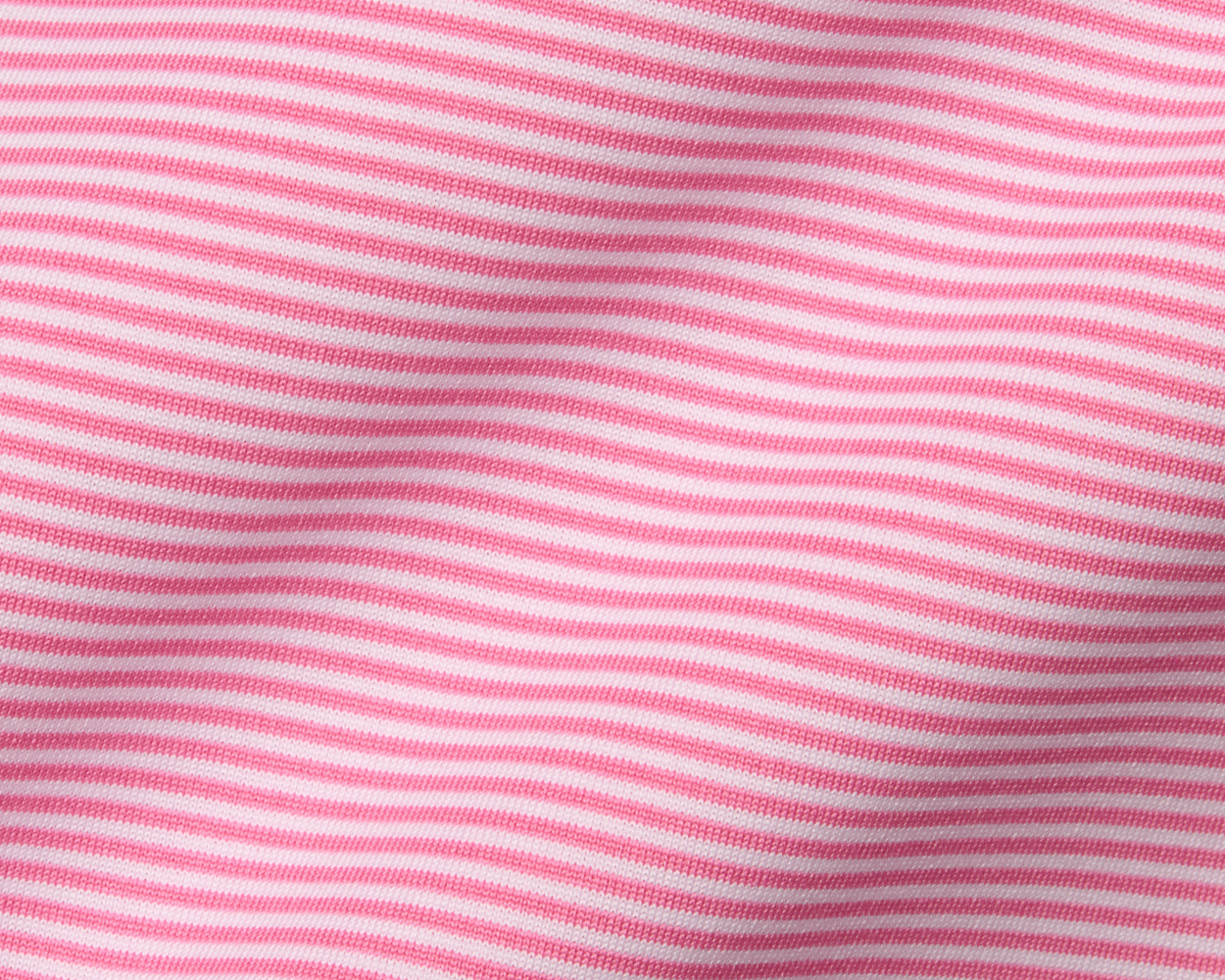 The Perkins Shirt: Belmont & White, featuring fine knit pink and white stripes, showcases a soft, wavy drape with a structured spread collar.