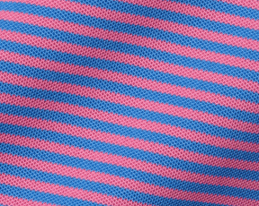 The Maxwell Shirt: Horizon Blue & Belmont, featuring textured pink and blue diagonal stripes in a stretchy, moisture-wicking knit for ultimate comfort and style.