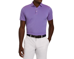 Model wearing The Maxwell Shirt: Horizon Blue & Belmont, a fitted striped polo with short sleeves, tucked into light trousers, paired with a dark woven belt.