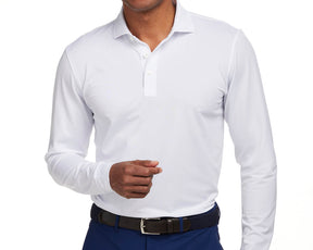 Front shot of Holderness and Bourne men's white long sleeve polo modeled on man's torso.