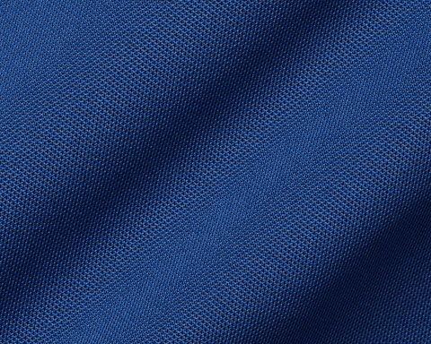 The Abbott Shirt: Andover showcases a textured blue knit, featuring a structured spread collar and contrast collar band piping for a modern, breathable design.