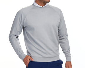 Front shot of Holderness and Bourne gray pullover sweater modeled on man's torso.