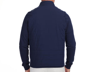 Back shot of Holderness and Bourne navy golf jacket modeled on man's torso.