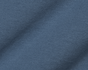 Close-up of the fine knit texture of The Montague Long Sleeve T-Shirt: Pacific Blue, showing the soft, even weave of the Peruvian Pima cotton blend fabric.