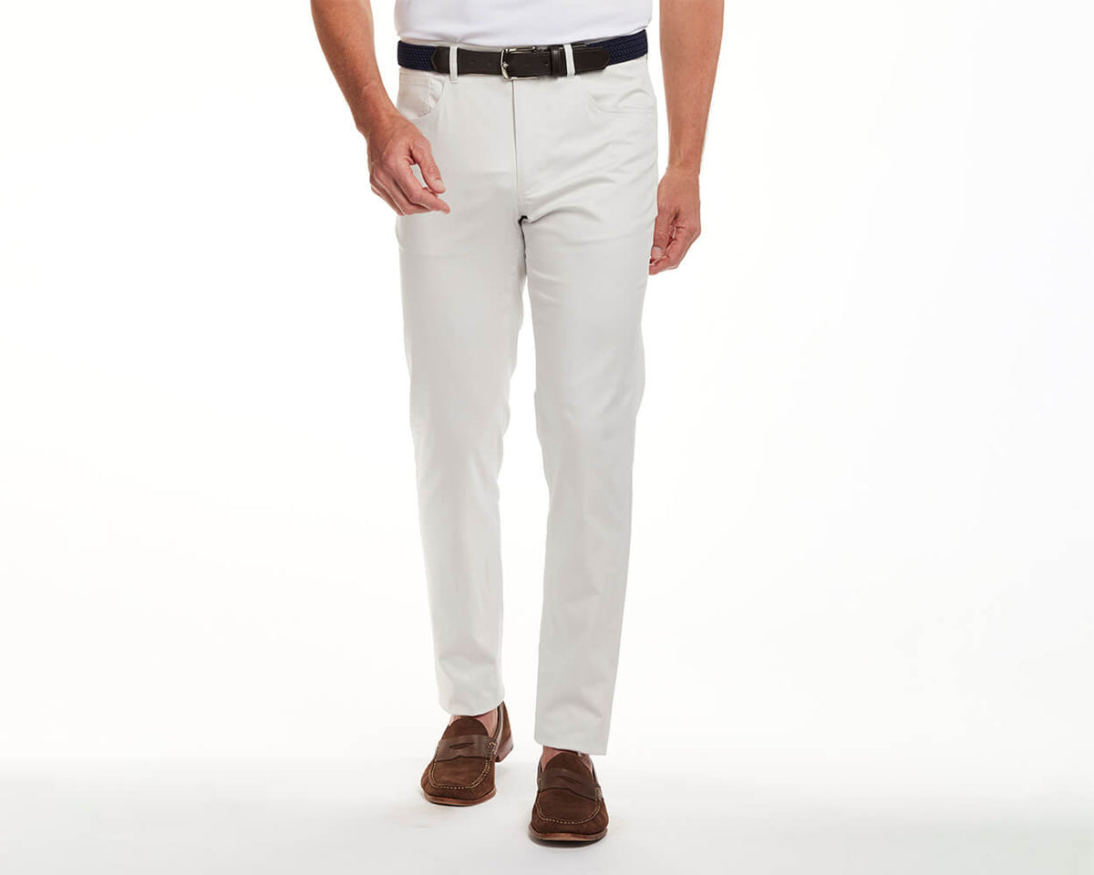 Front shot of Holderness and Bourne khaki inseam pants modeled on man's legs.