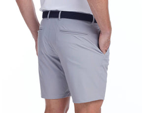Back shot of Holderness and Bourne lightweight golf shorts modeled on man's legs.