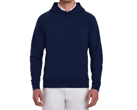 The Lawson Hoodie: Heathered Atlantic shown on a model, features a clean design with raglan sleeves, ribbed cuffs, over a white shirt and pants.