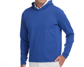 Front shot of Holderness and Bourne blue pullover hoodie modeled on man's torso.