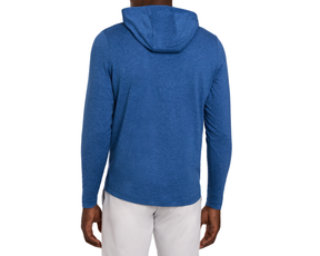 The Stowe Hoodie: Heathered Maidstone Blue, featuring a fitted cut, seam on hood, drop-tail hem, worn with light pants, arms relaxed.