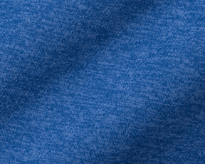 Close-up of The Stowe Hoodie in Heathered Maidstone Blue, showcasing the soft knit texture and fine loops of the premium performance fabric.