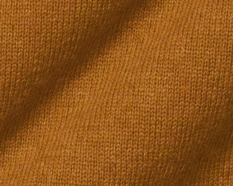 Close-up of Holderness & Bourne Men’s Golden Yellow Pullover Sweater fabric texture