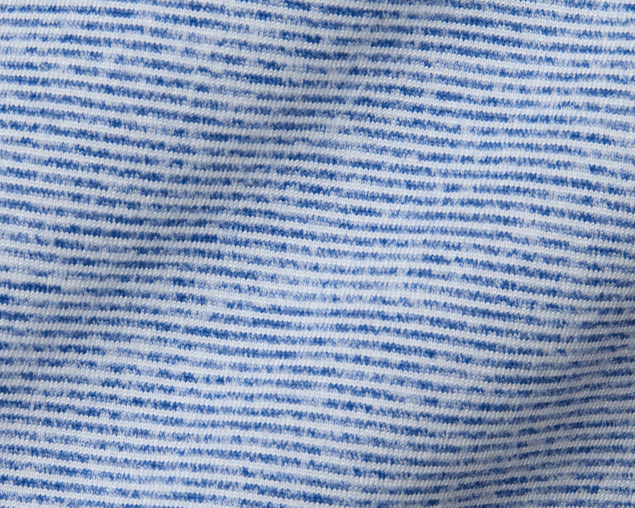 2026 U.S. Open Hamilton Pullover featuring fine pale blue and white stripes, showcasing lightweight jersey fabric with a heathered pattern for comfort and sun protection.