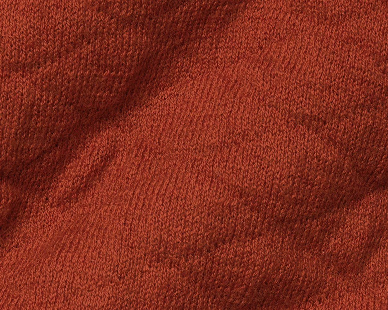 Close-up of textured Holderness & Bourne Men’s Rust Sweater fabric