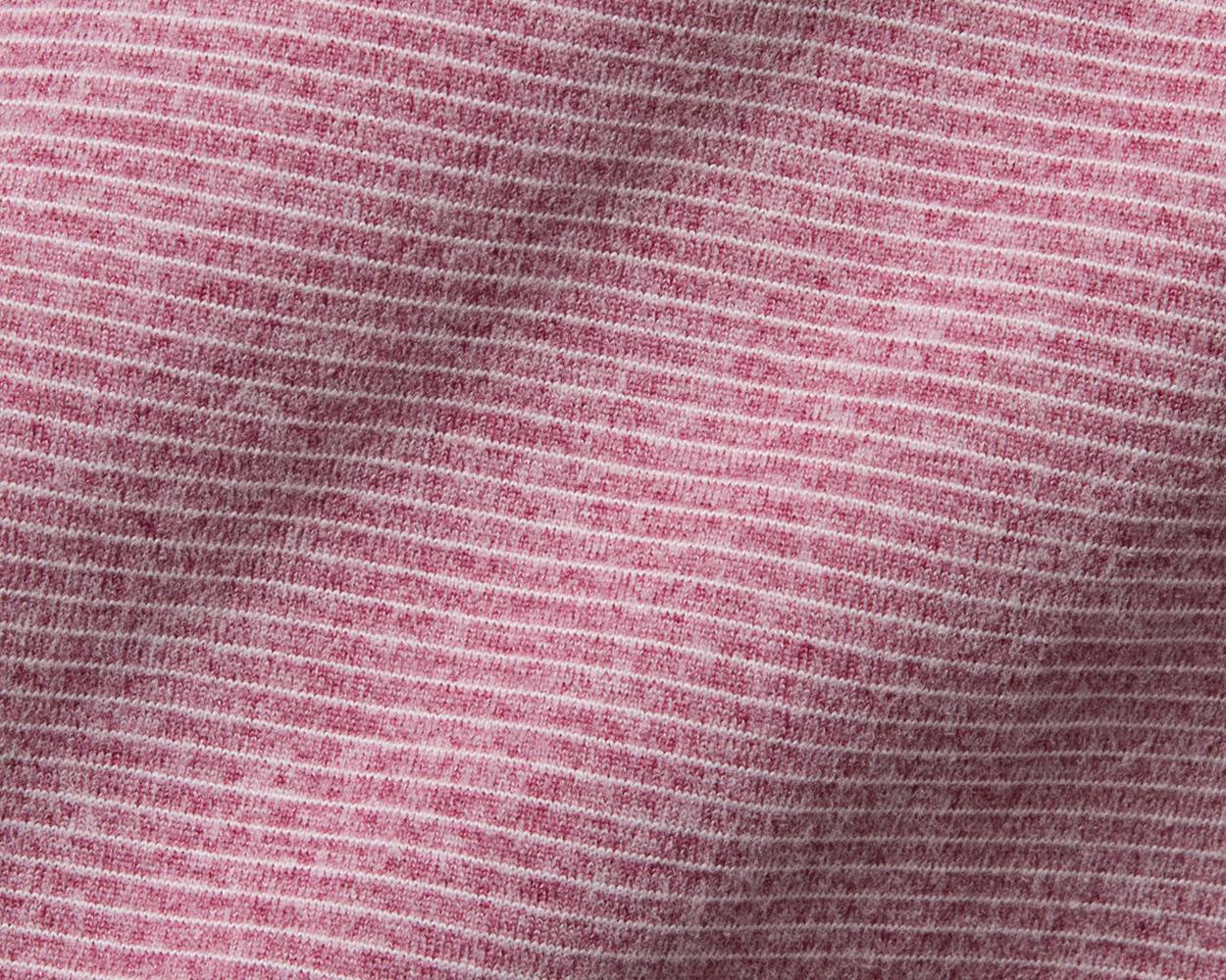 The Royce Quarter-Zip: Heathered Cabernet features a soft pink knit with fine white stripes, ideal for layering with built-in stretch and sun protection.
