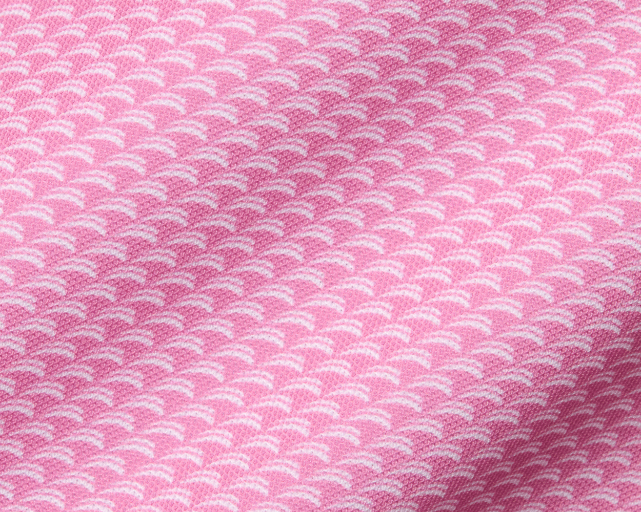 The Eaton Shirt: Belmont features a scallop-like pattern in soft, stretchy fabric, offering moisture wicking and UPF 30+ protection with a structured spread collar.