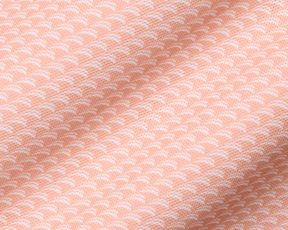 The Eaton Shirt: Nectarine, featuring a soft, peach-hued textile with a subtle wave pattern, designed for comfort, air circulation, moisture wicking, and sun protection.