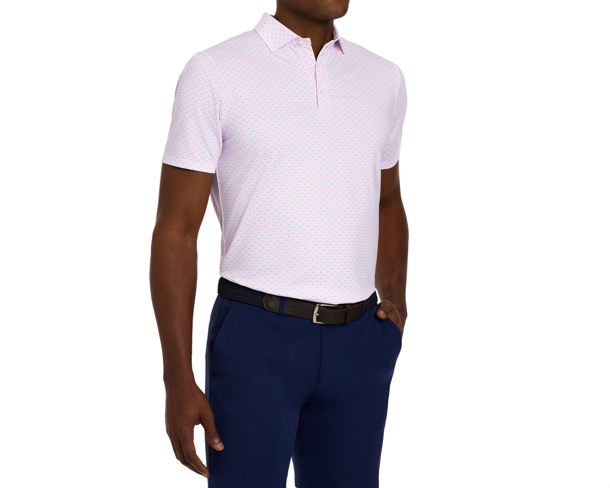 Man modeling The Cadogan Shirt: Belmont & Horizon Blue, a light pink polo with micro-print, paired with navy trousers and a dark woven belt.
