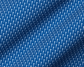 Close-up of the 2026 U.S. Open Hicks Shirt: Maidstone Blue, showcasing its blue fabric with a white geometric pattern, detailed knit texture, and gentle folds.