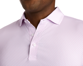 The Atwood Shirt: Belmont, featuring a geometric print, classic polo collar, and two buttons, crafted from performance jersey for comfort and sun protection.