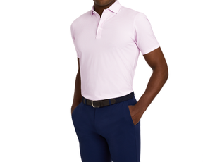 The Atwood Shirt: Belmont, a light-pink polo with subtle patterns, paired with dark-navy trousers and a woven belt, ideal for versatile, stylish comfort.