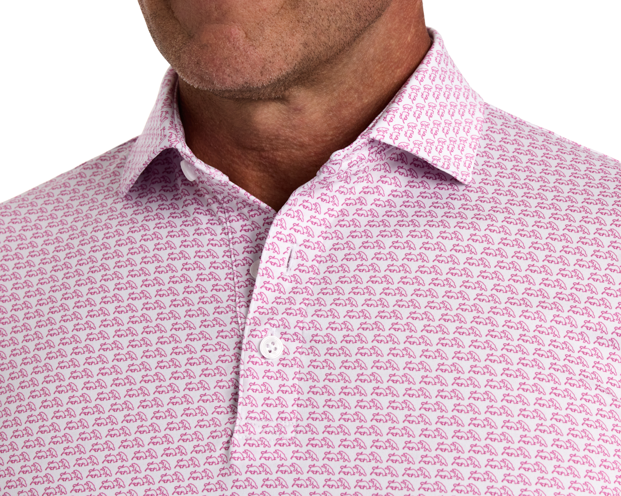 The Berkeley Shirt: Cabernet featuring pink animal silhouettes on white, seen on a man with an open collar and stubbly jawline.