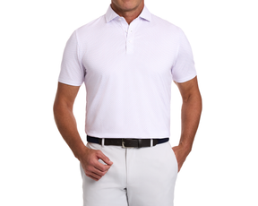 Man wearing The Cromwell Shirt: Belmont & Horizon Blue, showcasing short sleeves, a crisp look, and a structured collar, tucked into trousers with a dark belt.