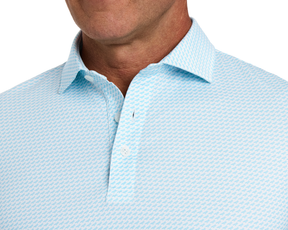 The Walton Shirt: Harbor, showcasing a light-blue polo with a subtle micro-pattern, fold-over collar, and airy AIRATION® fabric for comfort and breathability.