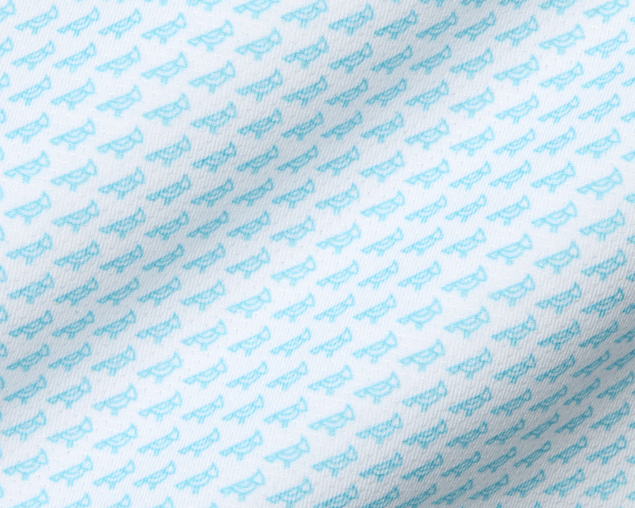 The Walton Shirt: Harbor features a light-blue whale motif on white fabric, showcasing a structured spread collar and AIRATION® fabric for breathability and sun protection.