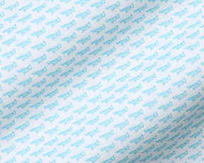 The Walton Shirt: Harbor features a light-blue whale motif on white fabric, showcasing a structured spread collar and AIRATION® fabric for breathability and sun protection.